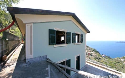 Villa con piscina e giardini vista golfo